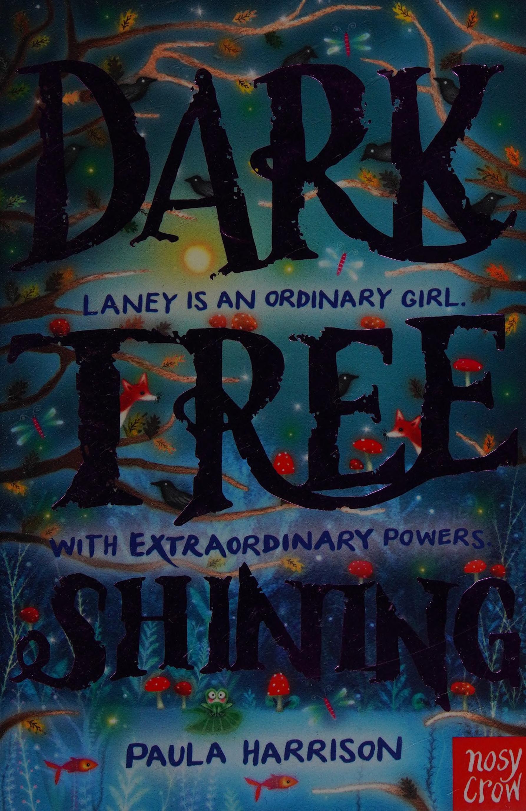 Dark tree shining